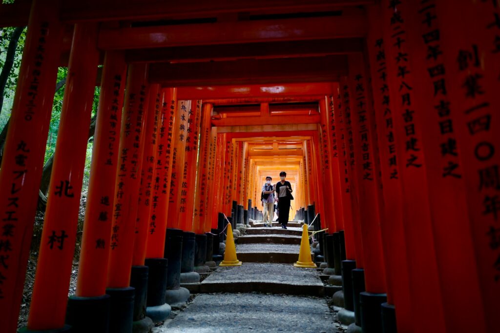 people walking on gray concrete stairs